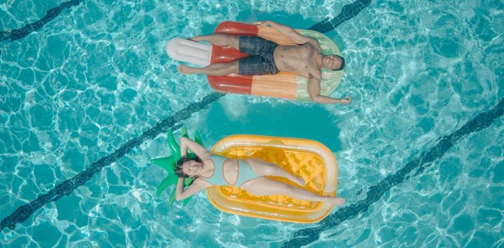man-and-women-on-floats-2
