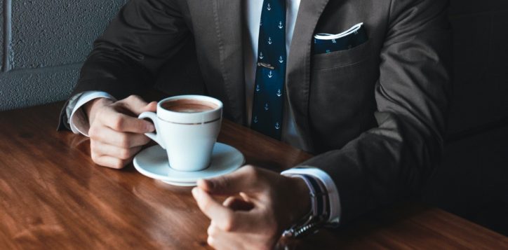 man-holding-coffee-cup-2