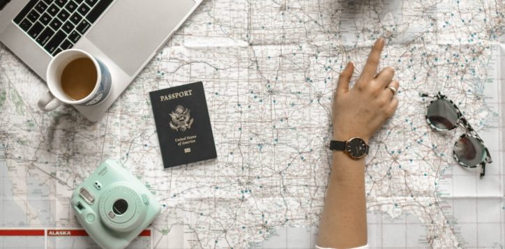women-pointing-on-map-2